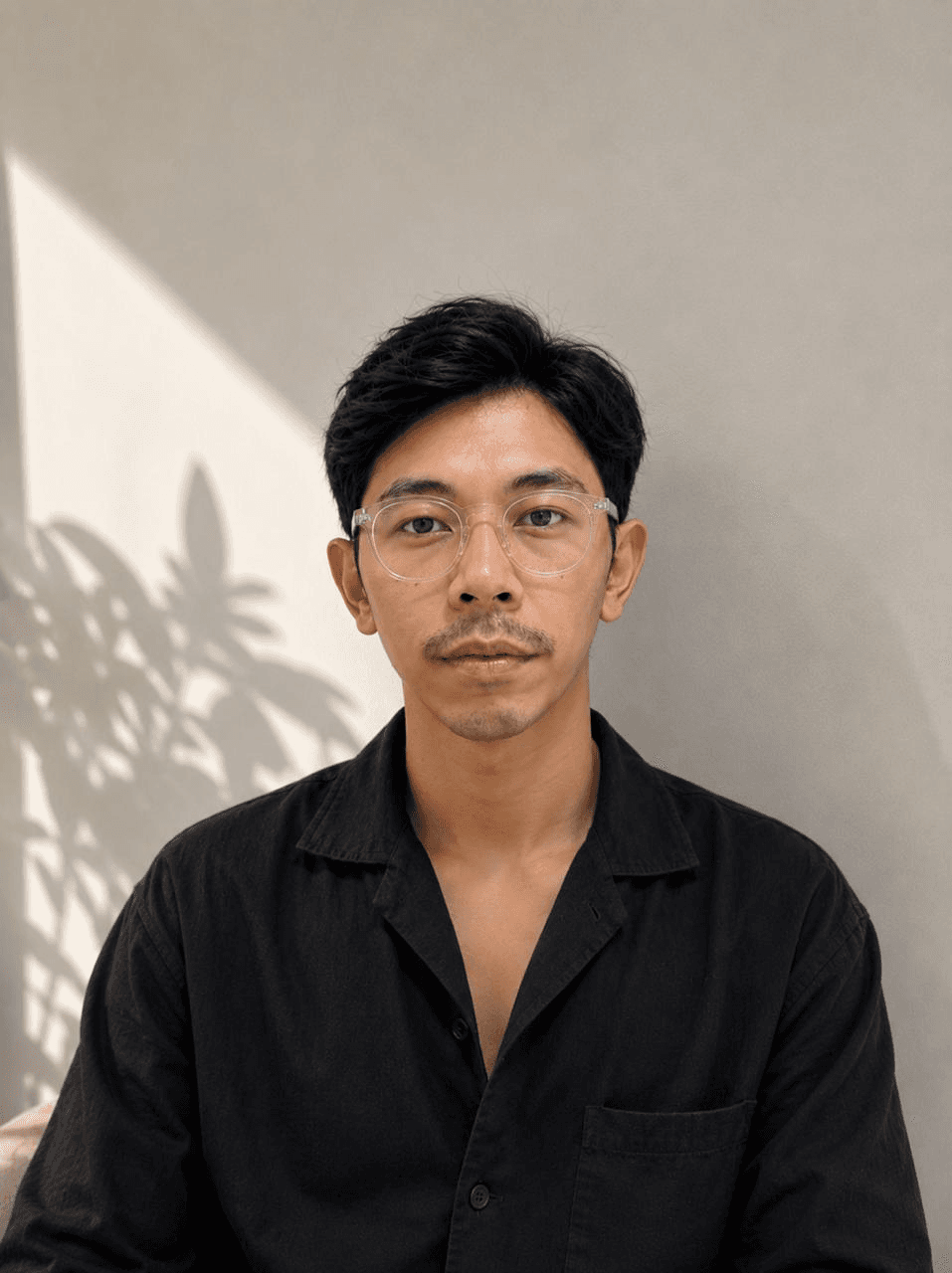 Professional portrait of Izzuddin Zaki